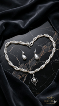 Double-strand pearl necklace with silver and pearl