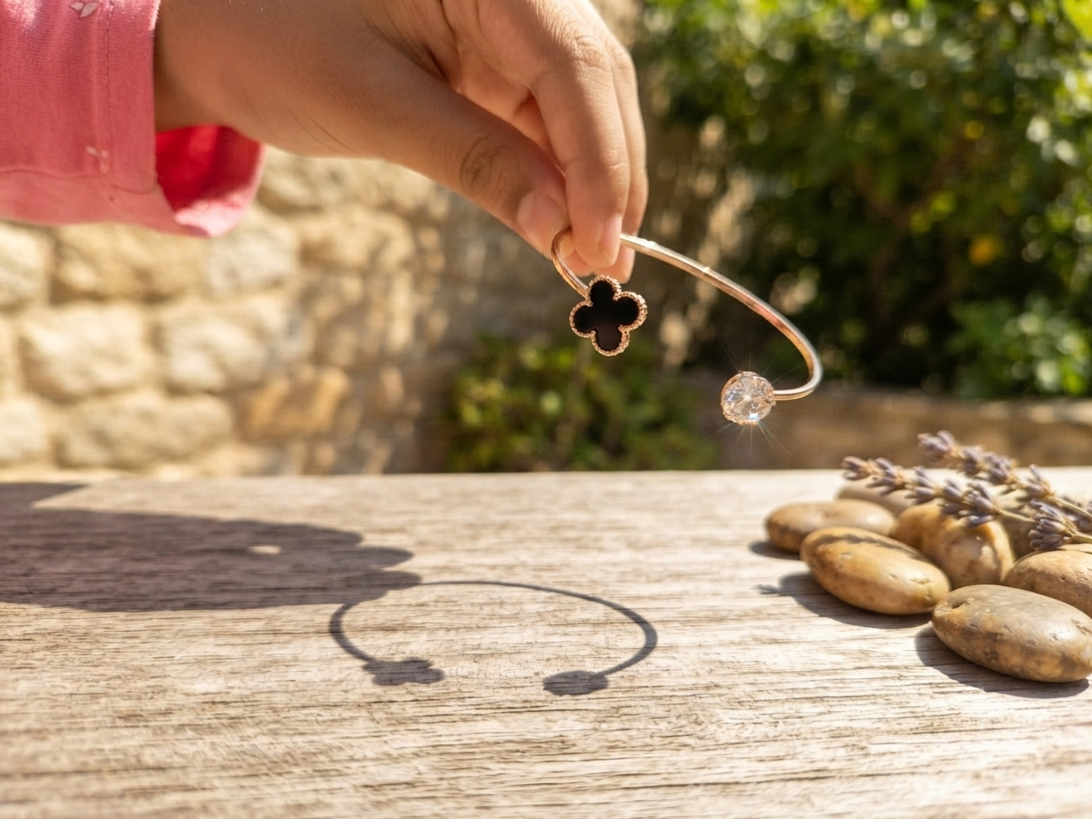 A graceful Golden open cuff adorned with a brilliant Butterfly