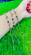Elegant silver-tone bracelet featuring vibrant tulip-inspired multicolor crystal stones, beautifully crafted🌷✨